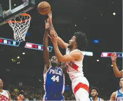  ?? JOHN E. SOKOLOWSKI / USA TODAY SPORTS ?? In his lone NBA pre-season game to date, Toronto’s Justin Champagnie pulled down a team-high 10 boards
and pumped in 17 points in a win over Philadelph­ia.