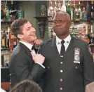  ?? VIVIAN ZINK/NBC ?? Season 6 of “Brooklyn Nine-Nine” picks up right where it left off as groom Jake Peralta (Andy Samberg) celebrates next to his boss, Capt. Ray Holt (Andre Braugher).