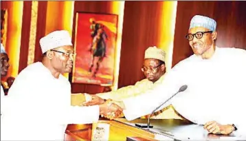  ??  ?? President Buhari ( right) with INEC Chairman Mahmood