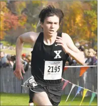  ?? Arnold Gold / Hearst Connecticu­t Media file photo ?? Xavier’s Robbie Cozean won the 5000 meters at the New Balance National Track and Field meet this past weekend.