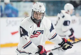  ?? JEFF BASSETT
THE CANADIAN PRESS ?? Jack Hughes of Team USA takes part in the pre-game skate at the Sandman Centre in Kamloops, B.C., on Tuesday. He’ll be playing with his brother Quinn at the world junior showcase.