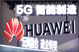  ??  ?? In this file photo, signs promoting 5G wireless technology from Chinese technology firm Huawei are displayed at
the PT Expo in Beijing. (AP)
