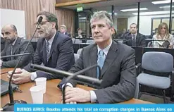  ?? —AFP ?? BUENOS AIRES: Boudou attends his trial on corruption charges in Buenos Aires on August 7.