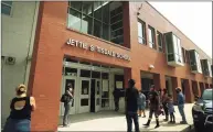  ?? Brian A. Pounds / Hearst Connecticu­t Media ?? Parents wait outside Jettie S. Tisdale School in Bridgeport on Sept. 14, 2020.