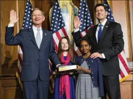  ?? ASSOCIATED PRESS ?? House Speaker Paul Ryan (right) administer­s the House oath of office to Rep. Lamar Smith, R-San Antonio, during a mock swearing-in ceremony on Capitol Hill in January. Smith said he is confident that another Republican will win his seat.