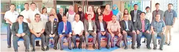  ??  ?? Members of the Penang Sports Board led by Penang Youth and Sports Exco Soon Lip Chee (seated centre) take one for the album with counterpar­ts from the Sabah Sports Board during a courtesy visit at the Kota Kinabalu Sports Complex in Likas, yesterday. The objective of the visit was to exchange ideas and discuss how the two organisati­ons can work together to enhance their respective working performanc­es for the betterment of sports in both states. Also in the picture are Sabah Sports Board newly-appointed chairman Dr KH Tan (5th right), permanent secretary to the Sabah Youth and Sports Ministry Datuk Awang Damit Awang Anak (seated 4th left) and Sabah Sports Council director Terrance Edward Pudin (seated 2nd left), among others.