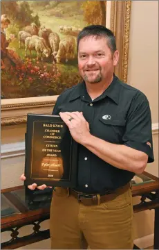  ?? STACI VANDAGRIFF/THREE RIVERS EDITION ?? Tyler Hyatt, general manager for Powell Funeral Home, was named Citizen of the Year at the annual Bald Knob Chamber Banquet on Feb. 29. Hyatt has served on the Bald Knob School Board, and served on Bald the Knob Chamber of Commerce Board and as its president, and is currently a volunteer captain with the Bald Knob Fire Department.