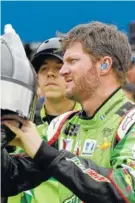  ?? THE ASSOCIATED PRESS ?? Dale Earnhardt Jr., shown before the June 16 qualifying for the NASCAR Cup series race in Brooklyn, Mich., finished sixth at Sonoma on Sunday and gave reporters what might have been his last postrace interview from the California track.