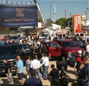  ?? TIM MILLER ?? Ford’s new lineup of F-series Super Duty trucks was on display at the Texas State Fairground­s in Dallas. The redesigned SD lineup, comprised of five models, will go on sale late next year.