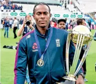  ??  ?? Jofra Archer celebrates with the World Cup