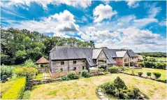  ??  ?? PRICE £1.025m
AGENT Savills
With huge vaulted ceilings and exposed beams, this converted barn has four bedrooms, woodlands and an orchard.
Four-bedroom property comes with its own orchard and woodland