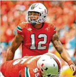  ?? AL DIAZ / MIAMI HERALD ?? Quarterbac­k Malik Rosier, who had shoulder trouble last week at North Carolina, was not listed on the injury report and appears good to go for tonight’s game.