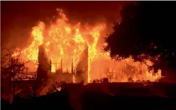  ?? — AFP ?? The main building at Paras Vinyards burns in the Mount Veeder area of Napa in California on Tuesday.