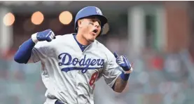  ?? BRETT DAVIS/USA TODAY SPORTS ?? Manny Machado’s defense, power help the Dodgers.