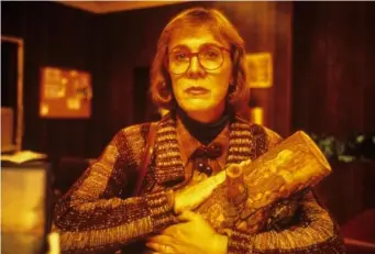  ??  ?? Catherin E Coulson as The Log Lady