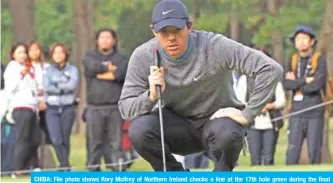  ??  ?? CHIBA: File photo shows Rory McIlroy of Northern Ireland checks a line at the 17th hole green during the final round of the PGA ZOZO Championsh­ip golf tournament at the Narashino Country Club in Inzai, Chiba prefecture on October 28, 2019. — AFP