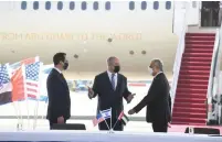  ?? ( Amos Ben Gershom/ GPO) ?? PRIME MINISTER Benjamin Netanyahu greets US Treasury Secretary Steve Mnuchin ( left) and United Arab Emirates Financial Affairs Minister Obaid Humaid al Tayer at Ben- Gurion Airport yesterday.