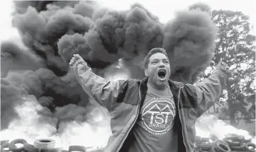  ??  ?? A member of Brazil’s Homeless Workers Movement (MTST) reacts during a protest against Temer in Sao Paulo, Brazil. — Reuters photo