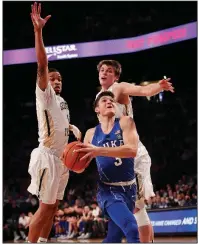  ?? AP/JOHN BAZEMORE ?? Duke guard Grayson Allen (3) drives between Georgia Tech guard Tadric Jackson (1) and Georgia Tech center Ben Lammers (44) Sunday in Atlanta. Allen scored 23 points as the Blue Devils won 80-69.