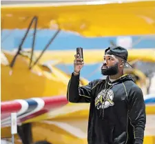  ?? ?? Hamilton Ticats linebacker Simoni Lawrence posted a video of himself walking down a hallway, tweeting, “Me reporting back to camp at 11:11 (p.m. ET).”