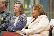  ?? LUIS SÁNCHEZ SATURNO THE NEW MEXICAN ?? Santa Fe Public Schools Superinten­dent Veronica García watches as school board candidates speak during a Santa Fe League of Women Voters candidate forum last week.