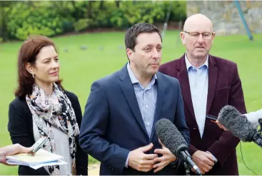  ??  ?? State opposition leader Matthew Guy at Drouin’s Civic Park on Tuesday to announce $2 million for a new ambulance station, with his wife Renae (left) and Member for Narracan Gary Blackwood.