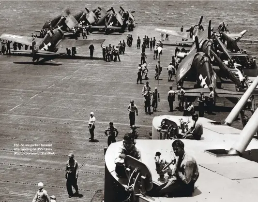  ??  ?? F6F-5s are parked forward after landing on USS Essex. (Photo courtesy of Stan Piet)