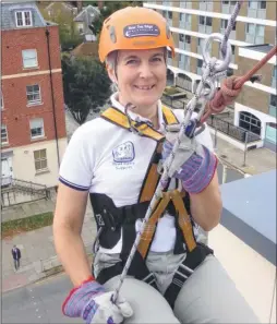  ??  ?? Paula Brown of Ashford took part in the KM Abseil Challenge