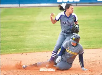  ?? STAFF PHOTO BY TIM BARBER ?? Tennessee Tech second baseman Alexis Trimiar turns for the throw as UTC’s Amanda Beltran is out at second during a Friday game at the Chattanoog­a Challenge.