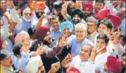  ?? PTI ?? Punjab Congress chief Sunil Jakhar with state cabinet minister Navjot Singh Sidhu and other leaders in Gurdaspur on Sunday.