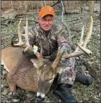  ?? (Photo submitted by Mike Stanley) ?? Mike Stanley of Highland retreated to a remote bit of public land to get his first Boone and Crockett Dec. 6 in Iowa.