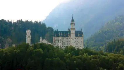  ??  ?? NEUSCHWANS­TEIN CASTLE perched on a hill in the Bavarian Alps.