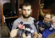 ?? MICHAEL CONROY — THE ASSOCIATED PRESS ?? In this Jan. 2, 2017, file photo, Indianapol­is Colts quarterbac­k Andrew Luck speaks to reporters at the NFL team’s practice facility in Indianapol­is. Luck will not play in Sunday’s Sept. 10 season opener against the Los Angeles Rams. General manager...
