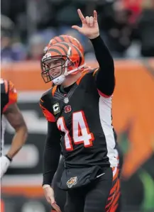  ?? John Grieshop/Getty Images ?? Quarterbac­k Andy Dalton will be in the spotlight on Sunday against San Diego as the Bengals will aim to break a playoff drought.