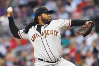  ?? John Bazemore / Associated Press ?? Giants starter Johnny Cueto went at least seven innings for the first time since May 12. The right-hander, who can opt out of his contract after the season, would be a coveted trade target.