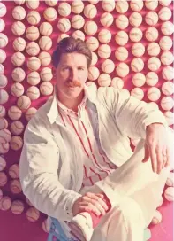  ??  ?? Free Press photograph­er Mary Schroeder used fishing line to string up practice balls for a profile shot to be used in a feature on Jack Morris during Spring Training.