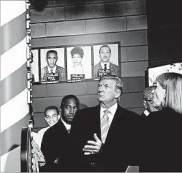  ?? SUSAN WALSH/AP ?? HUD Secretary Ben Carson, from left, President Donald Trump and Museum Division Director Lucy Allen tour the newly opened Mississipp­i Civil Rights Museum on Saturday.