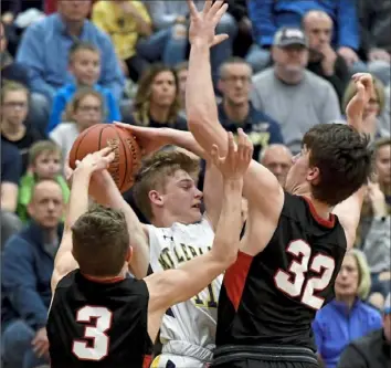  ?? Matt Freed/Post-Gazette ?? Upper St. Clair’s Ethan Dahlem and Andrew Casey double team Mt. Lebanon’s Blaine Gartley.