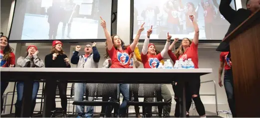  ?? COLIN BOYLE/SUN-TIMES PHOTOS ?? ABOVE: Supporters dance onstage at the Chicago Teachers Union headquarte­rs at a news conference on Sunday where the tentative deal reached with Acero charter schools to end the strike was discussed. LEFT: Froy Jimenez, a CTU member, makes noise in celebratio­n.