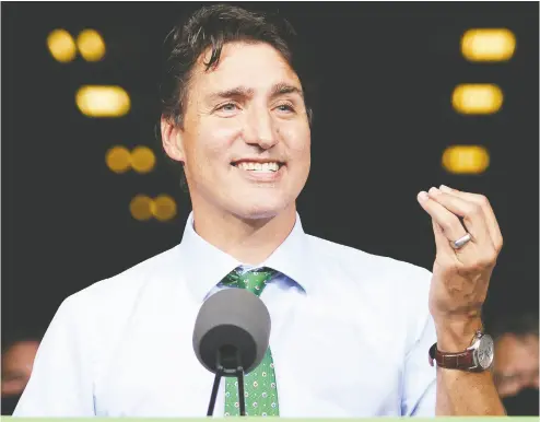  ?? GEOFF ROBINS / AFP VIA GETTY IMAGES ?? Prime Minister Justin Trudeau is a one-man lighthouse of virtue-signalling, says columnist Rex Murphy, adding that calling an election as an internatio­nal crisis unfolds in Afghanista­n was careless and self-centred.