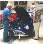  ??  ?? L E F T: Stephenson talks car design with Jay Leno for the DVD about his life story