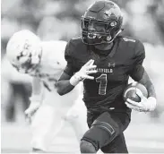  ??  ?? Rayshawn James of Westfield runs for the winning touchdown in overtime against Cy Ranch. Wilf Thorne / Contributo­r