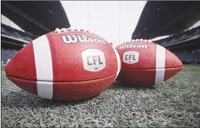  ?? Canadian Press photo ?? CFL balls are photograph­ed at the Winnipeg Blue Bombers stadium in Winnipeg in this 2018 file photo. The 2020 CFL season is being threatened by the COVID-19 pandemic.