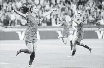  ?? ALESSANDRA TARANTINO THE ASSOCIATED PRESS ?? United States’ Alex Morgan celebrates after scoring her side’s second goal during a Women’s World Cup semifinal soccer match Tuesday against England. The U.S. won, 2-1, moving to the final for a third straight time.