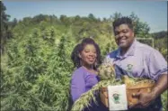  ?? DONALD REX BISHOP—ASSOCIATE PRESS ?? In Stanley-Anderson, Malcolm this September Anderson 2018photo Sr., Stanley-Anderson pose for provided pictures and by of her Clarenda their husband, hemp- “Cee” farming business, Green Heffa Farms, Inc., in Liberty, N.C. The Andersons’ hemp crop was wiped out by Hurricane Florence in September but with the federal legalizati­on of hemp included in the 2018U.S. Farm Bill, the couple plans to increase their production nearly tenfold next year. They will also have access to crop insurance for the first time.