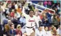  ?? Ben McKeown / Associated Press ?? Louisville’s Dana Evans reacts after hitting a 3-pointer during an NCAA women’s basketball game at the Atlantic Coast Conference women’s tournament against Florida State in Greensboro, N.C., on March 7. Evans is the preseason ACC player of the year.