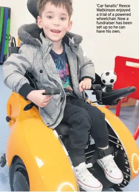  ??  ?? ‘Car fanatic’ Reece Watkinson enjoyed a trial of a powered wheelchair. Now a fundraiser has been set up so he can have his own.