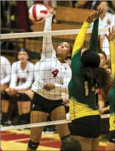  ?? VINCENT OSUNA PHOTO ?? Imperial High’s Alyssa Chavarria attacks the ball during a home game against Palo Verde Valley High on Thursday night in Imperial.