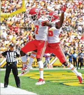  ?? JOE SARGENT/GETTY IMAGES ?? Kansas City’s Chris Conley celebrates with Damien Williams after a 15-yard touchdown reception in the first quarter Sunday against the Steelers in Pittsburgh. Patrick Mahomes threw a franchise-record-tying six scoring passes in the Chiefs’ 42-37 win. Mahomes finished 23 of 28 for 326 yards in his third career start.