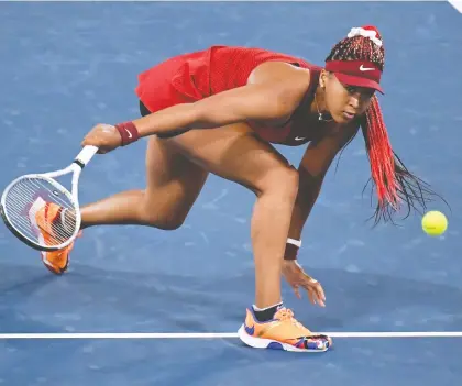  ?? PIROSCHKA VAN DE WOUW/REUTERS ?? World No. 2 Naomi Osaka withdrew from the Canadian Open this week, citing fatigue after she was upset in the third round of the Olympic tournament in Tokyo. She's not the only top women's player who won't be making the trip to Montreal.